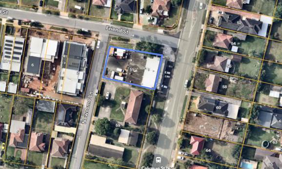 Aerial view of a neighborhood
Description automatically generated