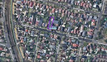 An aerial view of a neighborhood

Description automatically generated