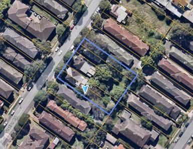 A aerial view of a neighborhood

Description automatically generated